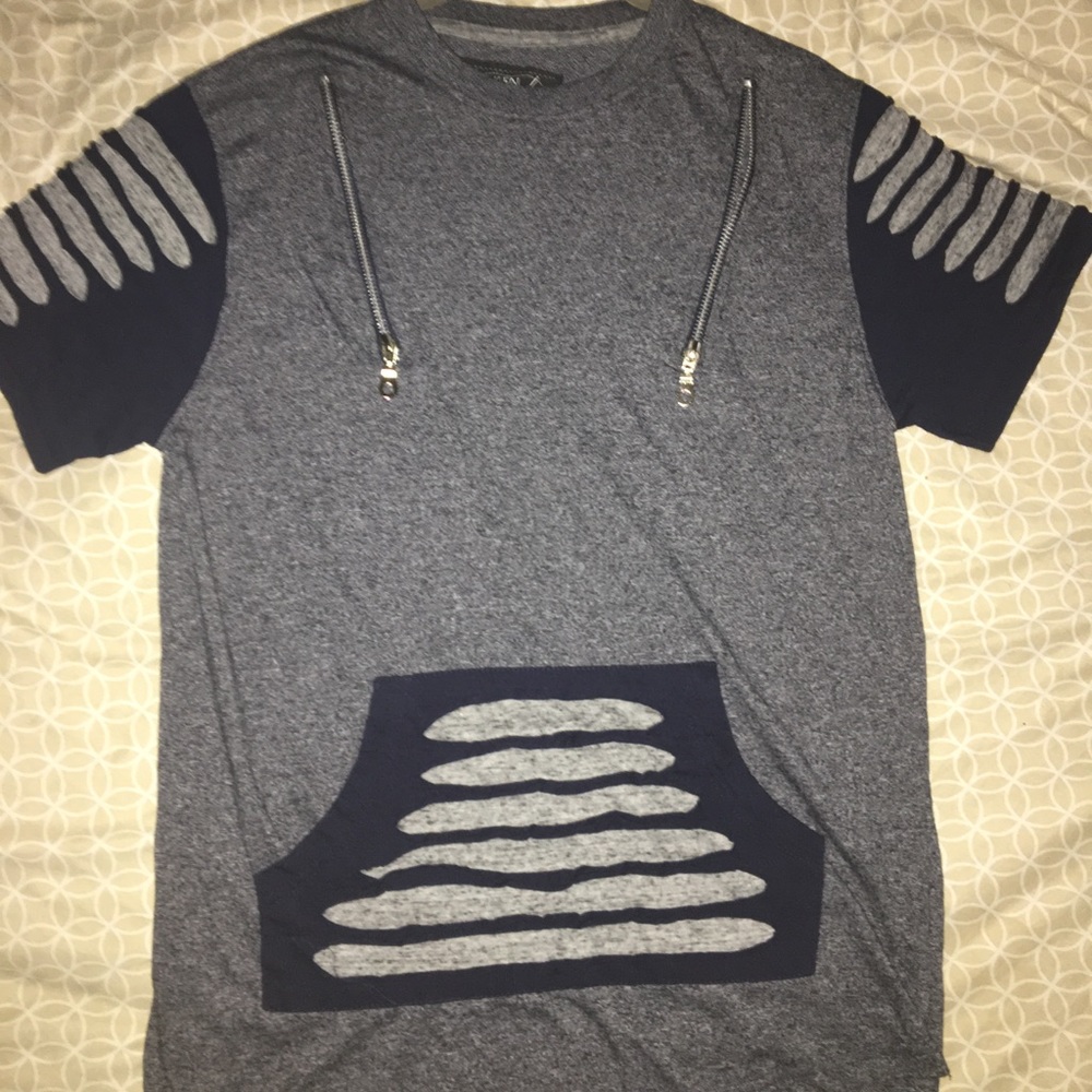 Men’s shirt, by Broken Threads.